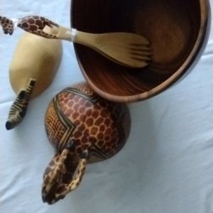 Unique and fun wooden salad bowl set with giraffe servers, bowl, & zebra dish.